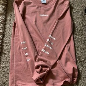 Brand new Adidas shirt never worn.